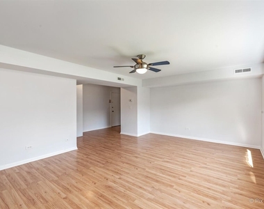 1610 W Jarvis Avenue - Photo Thumbnail 8