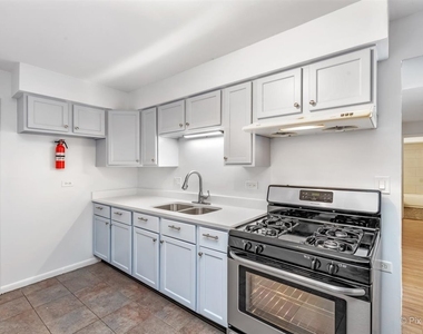 1610 W Jarvis Avenue - Photo Thumbnail 3