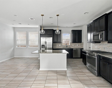 7035 Coneflower Creek Court - Photo Thumbnail 3