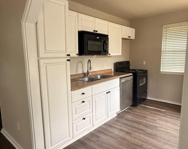 8432 Garland Street - Photo Thumbnail 8