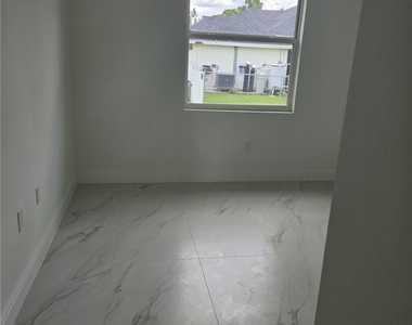 2604 E 13th Street - Photo Thumbnail 4