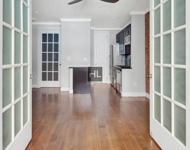 E 26th St. - Photo Thumbnail 7