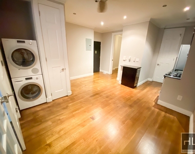 E 26th St. - Photo Thumbnail 8