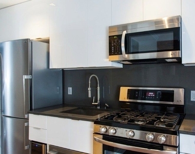 E 26th St. - Photo Thumbnail 1