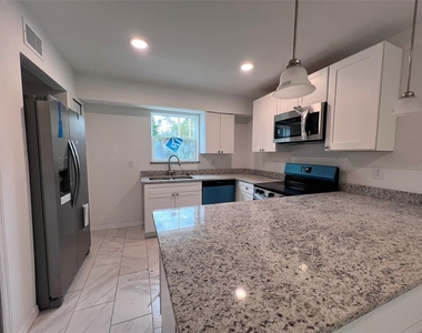 5317 Curry Ford Road - Photo Thumbnail 1