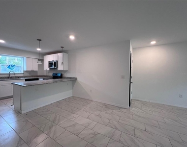 5317 Curry Ford Road - Photo Thumbnail 4