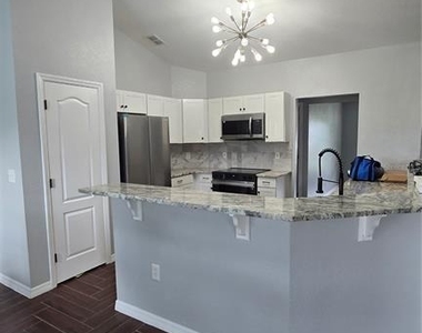 7704 Canterbury Circle - Photo Thumbnail 2