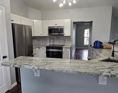 7704 Canterbury Circle - Photo Thumbnail 3