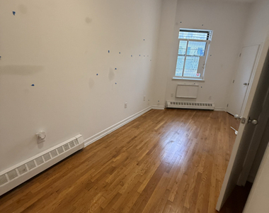 211 West 117th Street - Photo Thumbnail 1