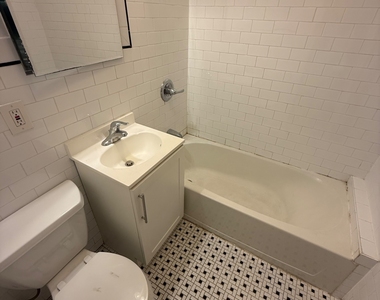 E 89th St - Photo Thumbnail 6
