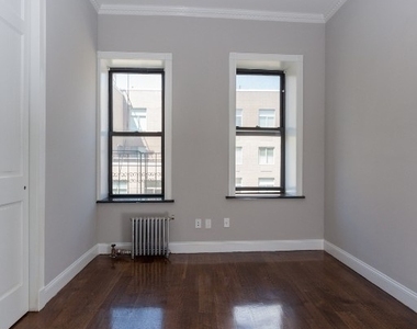 East 100th Street - Photo Thumbnail 3
