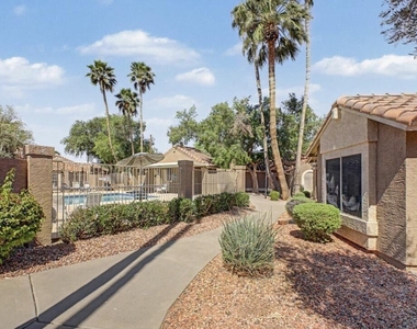 7040 W Olive Avenue - Photo Thumbnail 2