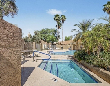 7040 W Olive Avenue - Photo Thumbnail 4