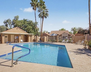 7040 W Olive Avenue - Photo Thumbnail 3