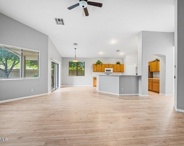 9231 W Salter Drive - Photo Thumbnail 1