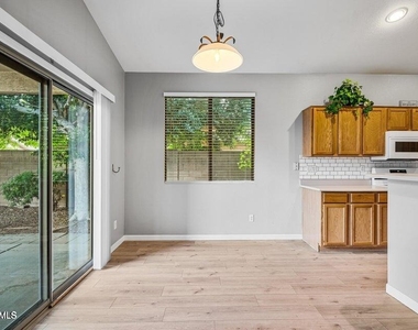 9231 W Salter Drive - Photo Thumbnail 12