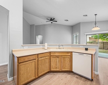 9231 W Salter Drive - Photo Thumbnail 20