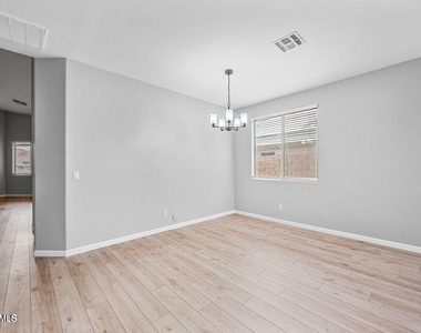 9231 W Salter Drive - Photo Thumbnail 14