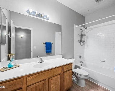 9231 W Salter Drive - Photo Thumbnail 7
