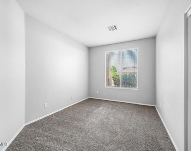 9231 W Salter Drive - Photo Thumbnail 10