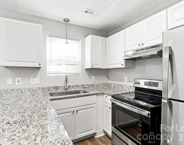 8419 Milton Morris Drive - Photo Thumbnail 3