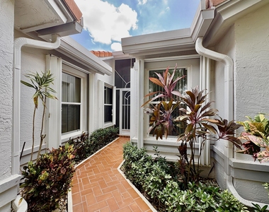 7702 Majestic Palm Drive - Photo Thumbnail 1