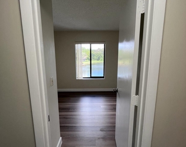 1002 Green Pine Boulevard - Photo Thumbnail 5