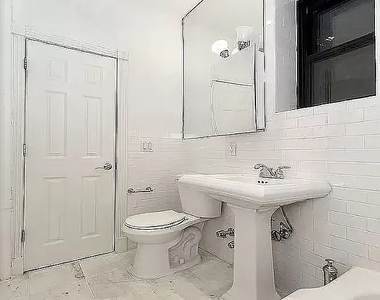 338 East 55th Street - Photo Thumbnail 4