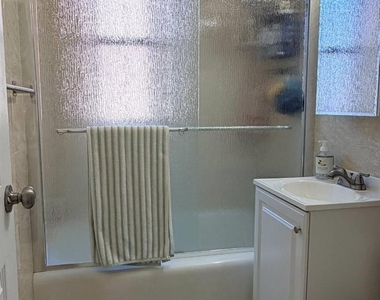 102-36 64 Avenue - Photo Thumbnail 1