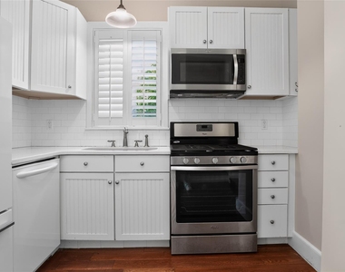 1058 Plandome Road - Photo Thumbnail 6