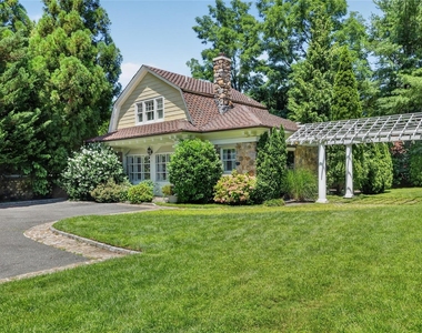 1058 Plandome Road - Photo Thumbnail 1