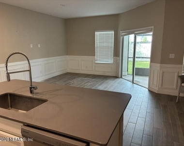 1606 Pottsburg Point Drive - Photo Thumbnail 2