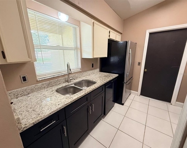 14050 Ithaca Way - Photo Thumbnail 1