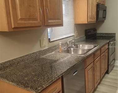 3360 S Osprey Avenue - Photo Thumbnail 2