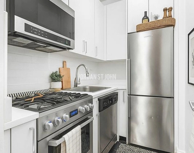 E 37TH ST - Photo Thumbnail 2