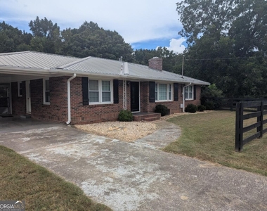 6115 Jewell Bennett Road - Photo Thumbnail 1