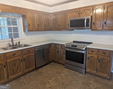 6115 Jewell Bennett Road - Photo Thumbnail 13