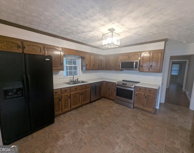6115 Jewell Bennett Road - Photo Thumbnail 14