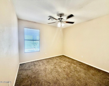 9323 W Harmony Lane - Photo Thumbnail 14