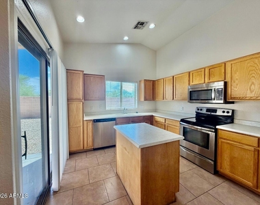 9323 W Harmony Lane - Photo Thumbnail 2