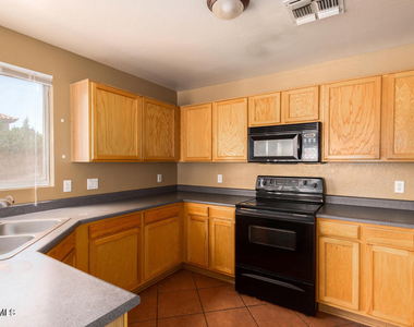12221 W Aster Drive - Photo Thumbnail 8