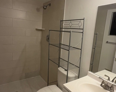 7406 Woodmont Avenue - Photo Thumbnail 9