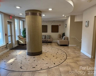 1000 E Woodlawn Road E - Photo Thumbnail 19