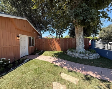7031 Bellaire Ave - Photo Thumbnail 4