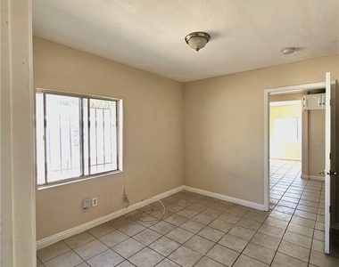 1445 W 82nd - Photo Thumbnail 6