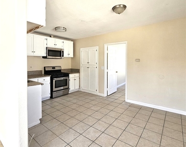 1445 W 82nd - Photo Thumbnail 2
