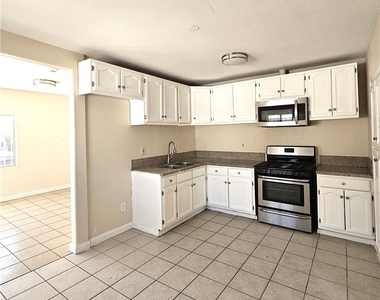 1445 W 82nd - Photo Thumbnail 1