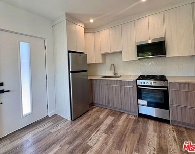 8045 Darby Avenue - Photo Thumbnail 3