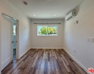8045 Darby Avenue - Photo Thumbnail 6