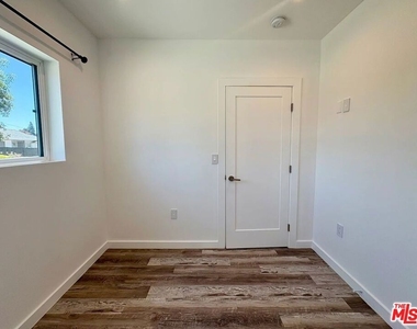 8045 Darby Avenue - Photo Thumbnail 8